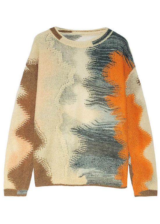 Kvinnors stickad tröja med trendig urtagning, perfekt för höstmode. Bekväm och stilren.