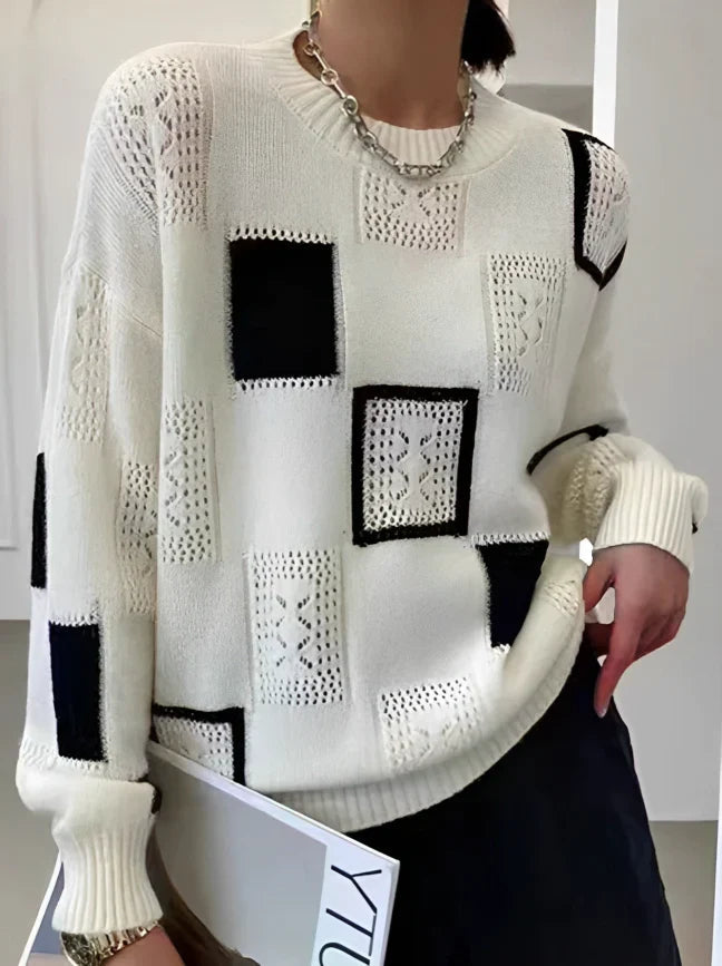Elegant kvinnors tröja, vintage inspirerad patchwork-design. Mjuk och bekväm för höst och vinter, perfekt vardagsstil.