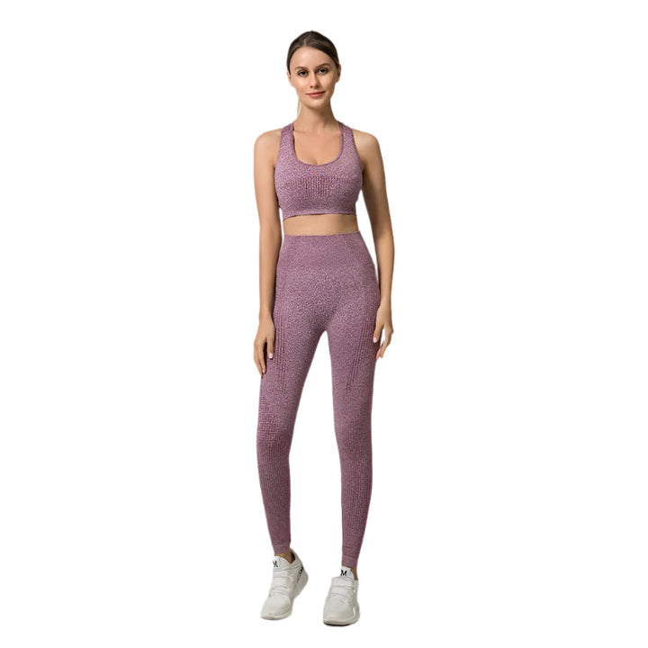 Kvinnors stilrena träningsset med långärmad topp & leggings. Perfekt för yoga, gym & aktiv vardag.