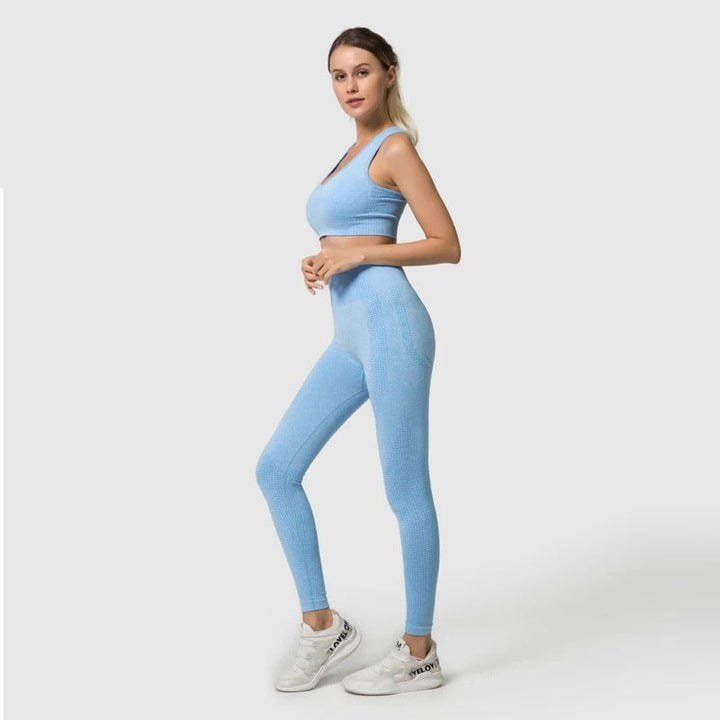 Mångsidigt kvinnors träningsset för sport & vardag. Bekväma leggings & långärmad topp för aktivitet.