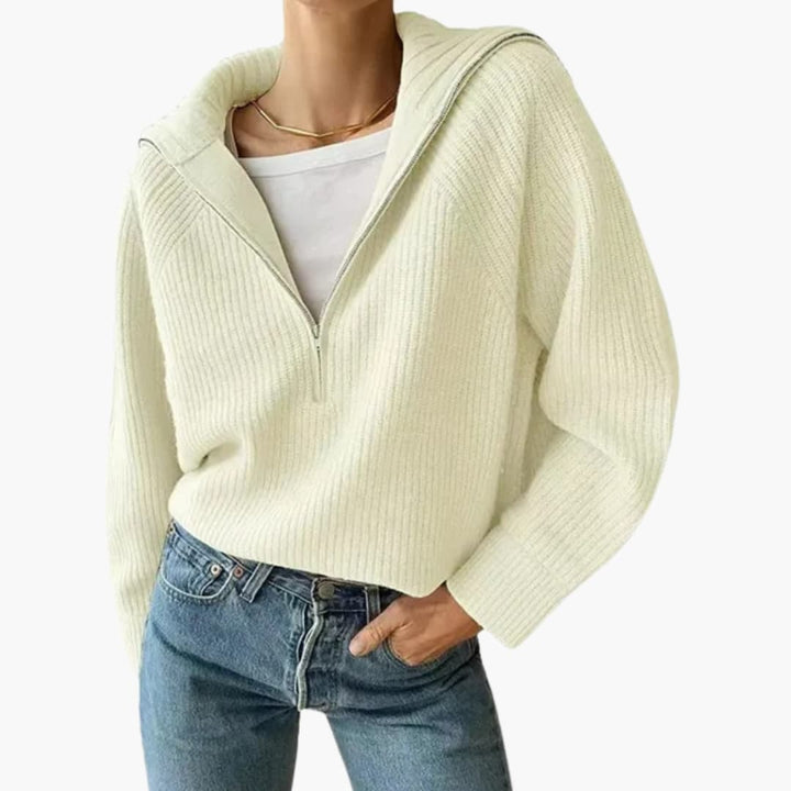 Kvinnors vardagströja med elegant stativkrage och justerbar halv blixtlås, ett mångsidigt plagg.