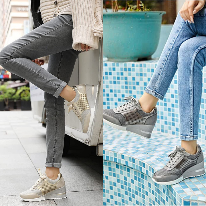 Kvinnors trendiga kilklack sneakers bärs. Stilfulla och bekväma mode sneakers perfekta för vår och höst.