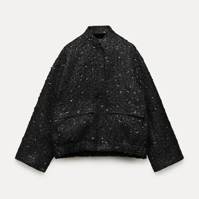 Chic paljettjacka för dam, ett trendigt ytterplagg som ger stil till varje outfit.