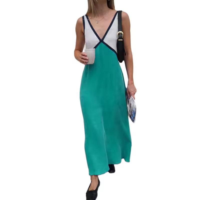 Mode V-ringad midi klänning för kvinnor. Trendigt färgblock design, elegant för vår, sommar och fest.