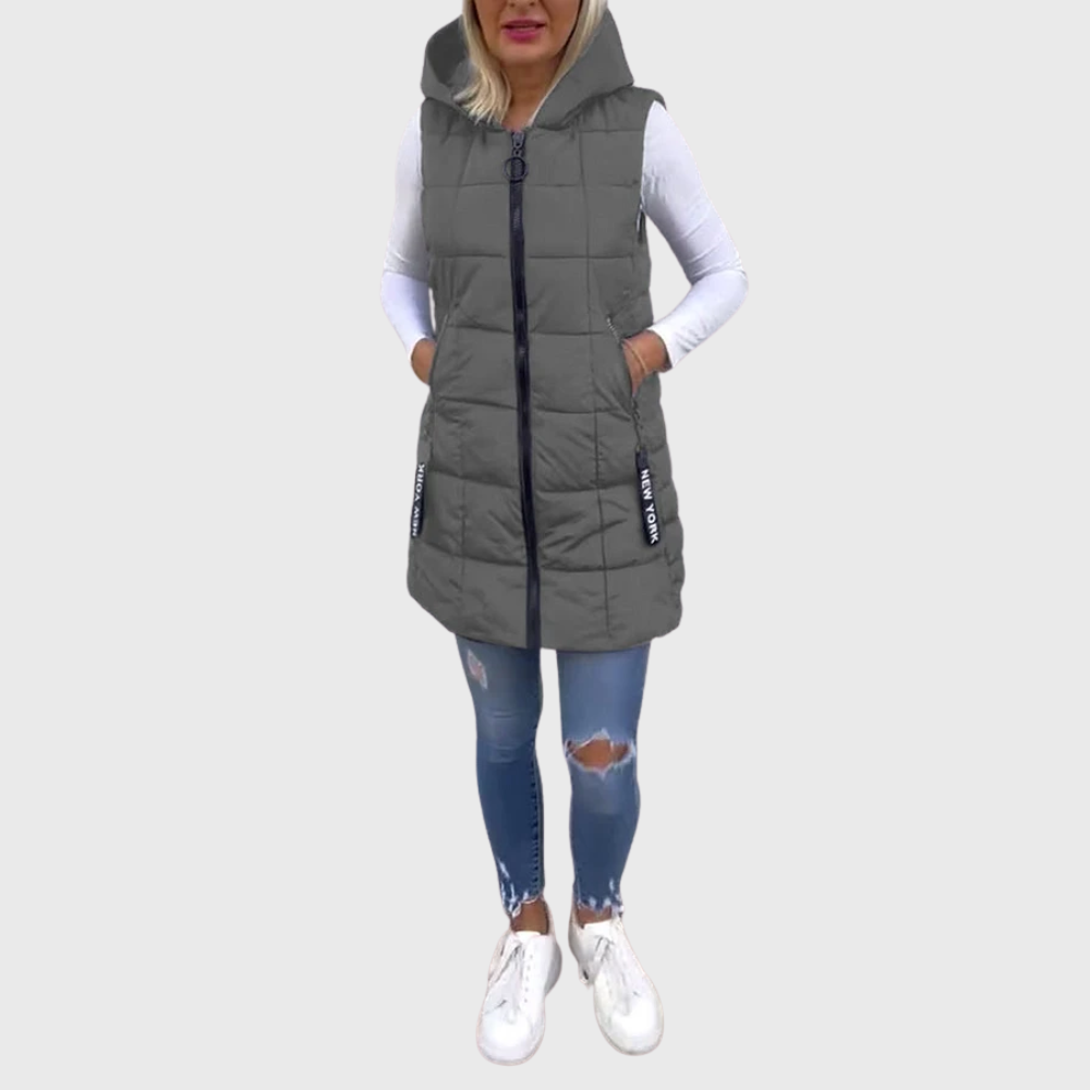 Urban ärmlös puffer-väst för kvinnor. Snygg quiltad jacka i modern streetwear-stil.