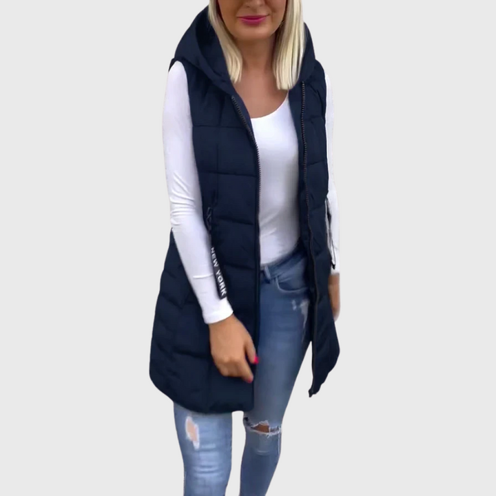 Trendig ärmlös damkappa. Vadderad streetwear-stil med dragkedja, perfekt för höst & vinter.