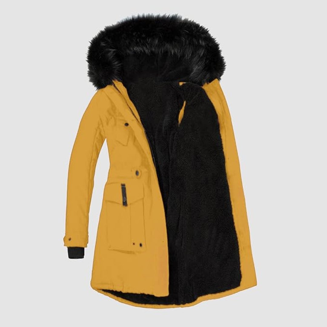 Kvinnors parkas med justerbar midja för smickrande passform. Varm vinterjacka med huva och fuskpäls.
