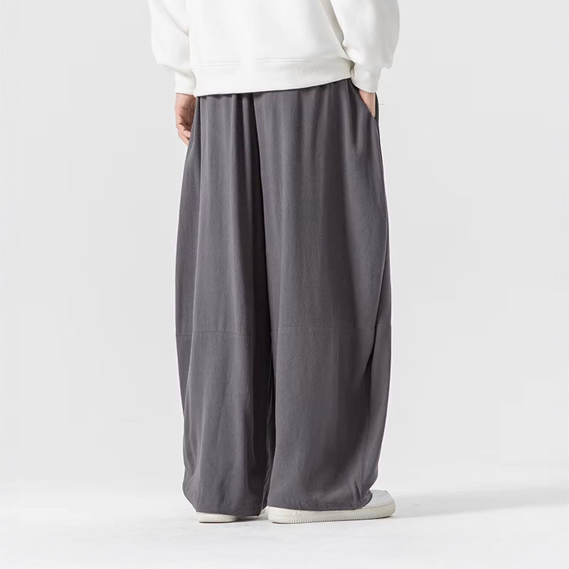 Mjuka, vida dam byxor med oversized passform, sidfickor & modern silhuett.