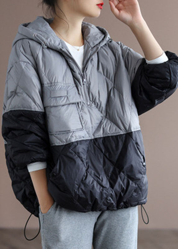 Elegant vinterkappa för kvinnor i boho stil. Avslappnad passform med huva, perfekt för kallt vintermode.