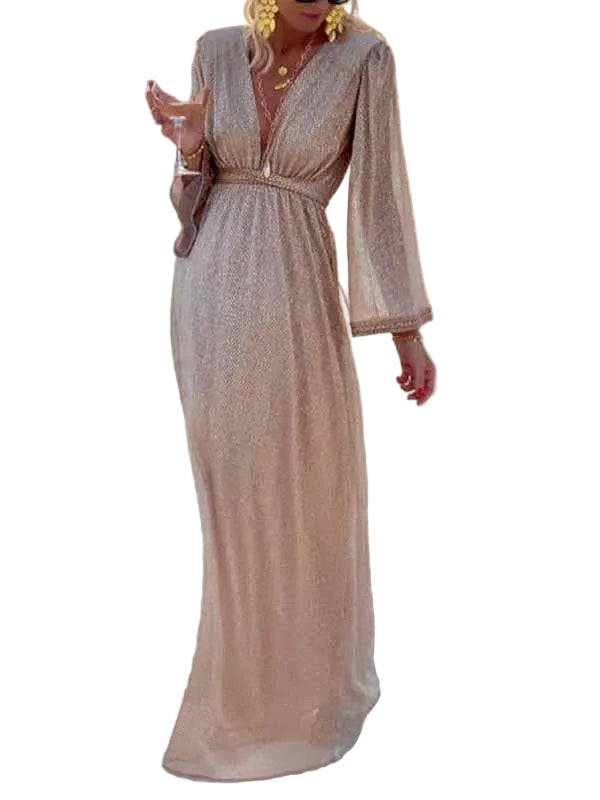 Lång glittrig festklänning för kvinnor med elegant v-ringning. Perfekt paljettklänning för kvällsoutfit.