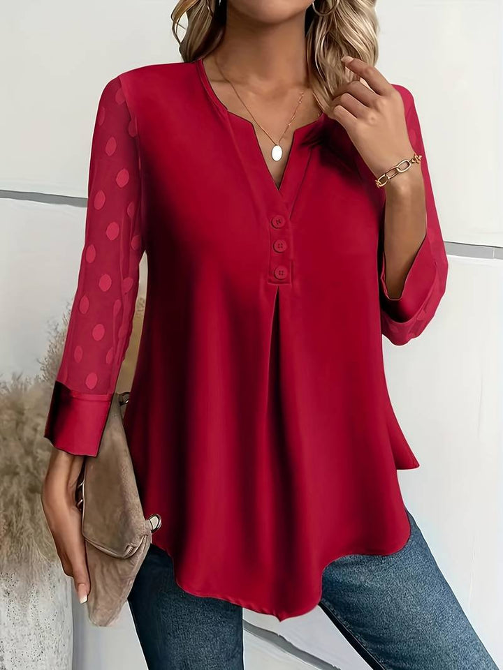Mjuk och bekväm långärmad damtopp med elegant hackad hals. Ett snyggt basplagg i kvinnors mode.