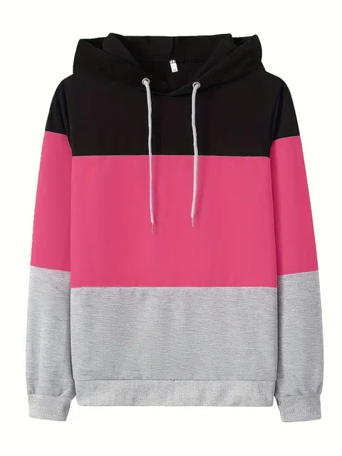 Bekväm långärmad damtröja med trendiga färgblock. En avslappnad och stilren vardagströja för dammode.