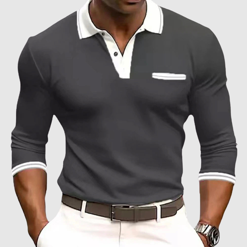 Klassisk långärmad herrtröja i casual stil med polo-krage och diskreta kontrastdetaljer för en elegant look.