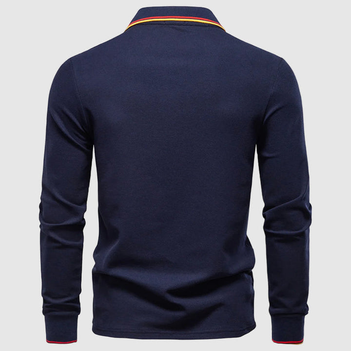 Höst/vår pikétröja herr, långärmad och slim fit, ger tidlös elegans och komfort. Stilren.