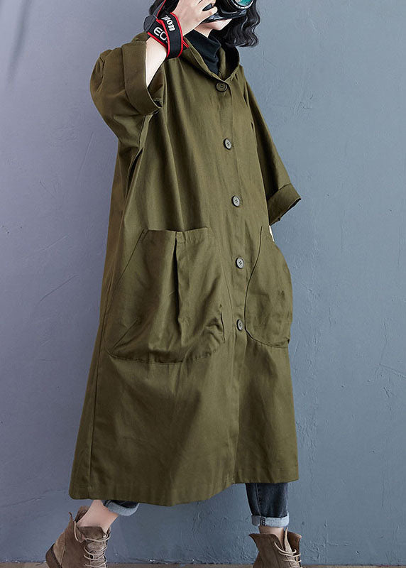 Bekväm lång damtrenchcoat med avslappnad passform, huva och fickor. Stilren och praktisk kvinnokappa för kalla dagar.