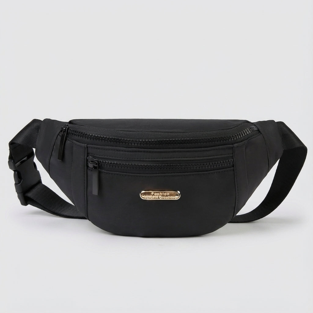 Kompakt & lätt unisex midjeväska i nylon för vardagsbruk. Rymmer dina nödvändigheter smidigt & säkert.