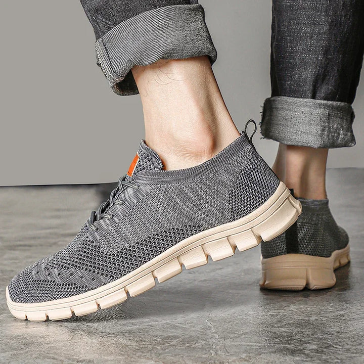 Andningsbara herr sneakers i grått med antislip-sula, idealiska för promenader och utomhuskomfort.