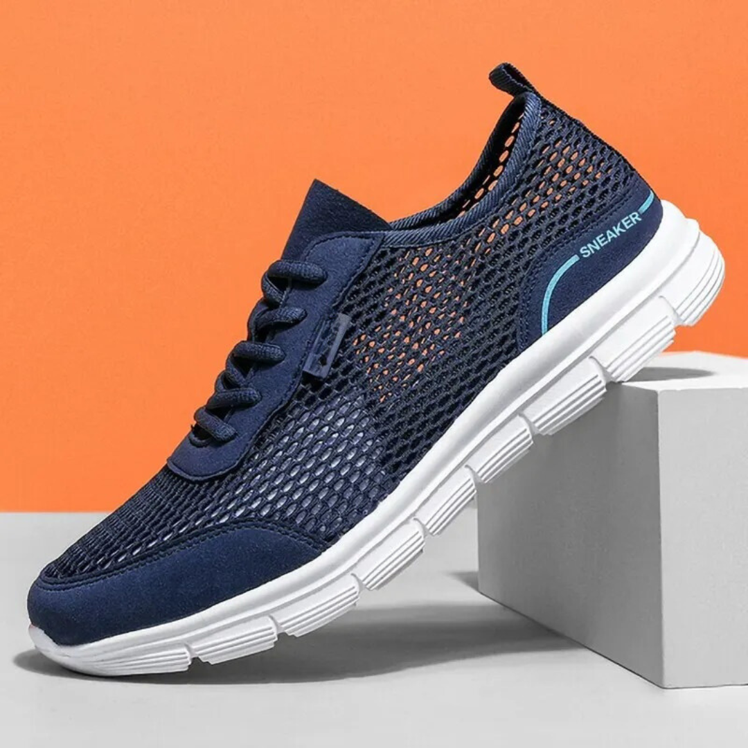 Grå herr löparskor med andningsbart ovandel, idealiska för löpning. Bekväma sneakers för aktiv livsstil.