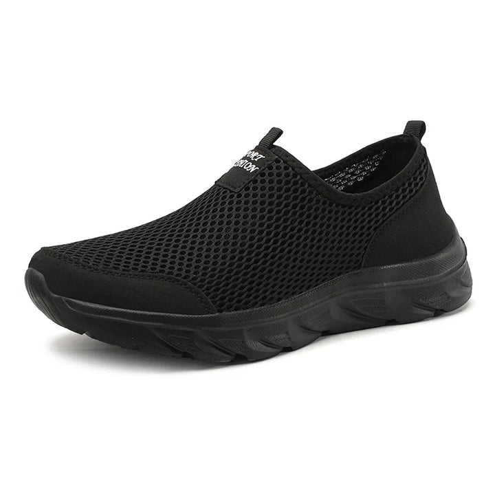 Bekväma slip-on herrskor i vardagsmiljö. Lätta sneakers för en aktiv livsstil och mode.