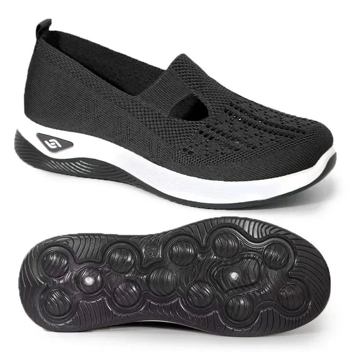 Lätta svarta slip-on sneakers för kvinnor med stöd. Perfekta bekväma vardagsskor.
