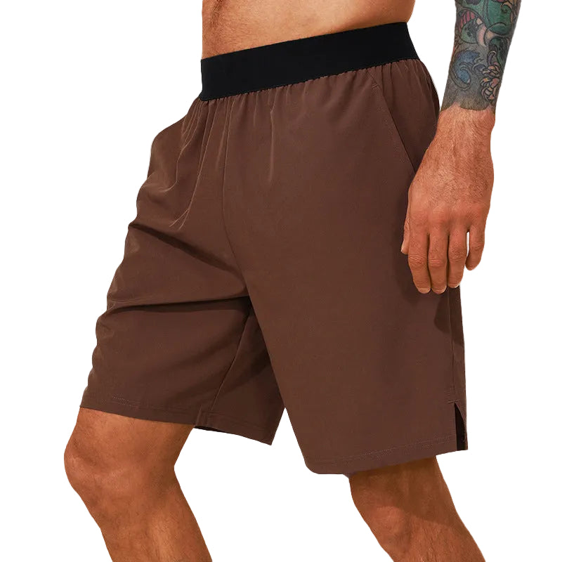 Lätta träningsshorts herr i snabbtorkande material för optimal komfort. Perfekta gym- och löparshorts.