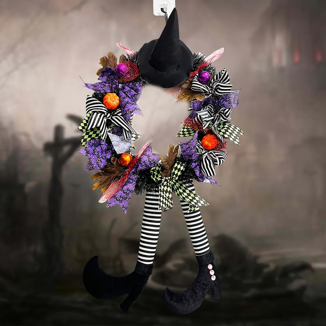 Dörrkrans med färgglada häxben, en lekfull och skrämmande detalj för din Halloween-fest.