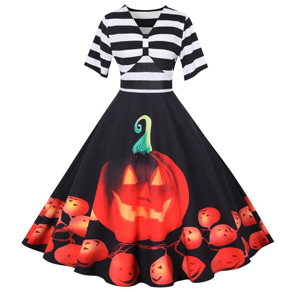 Lekfull retro damklänning i midi-längd med festligt pumpamotiv, perfekt för Halloween & höstfester. Kvinnokläder.