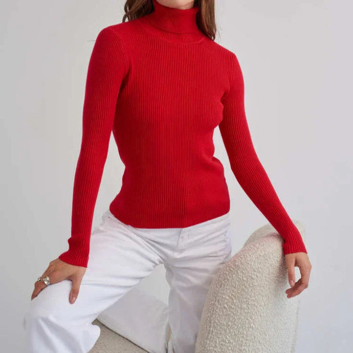 Gul stickad damtröja med polokrage och ribbad textur. Perfekt för kontoret, bekväm vardagsstil.