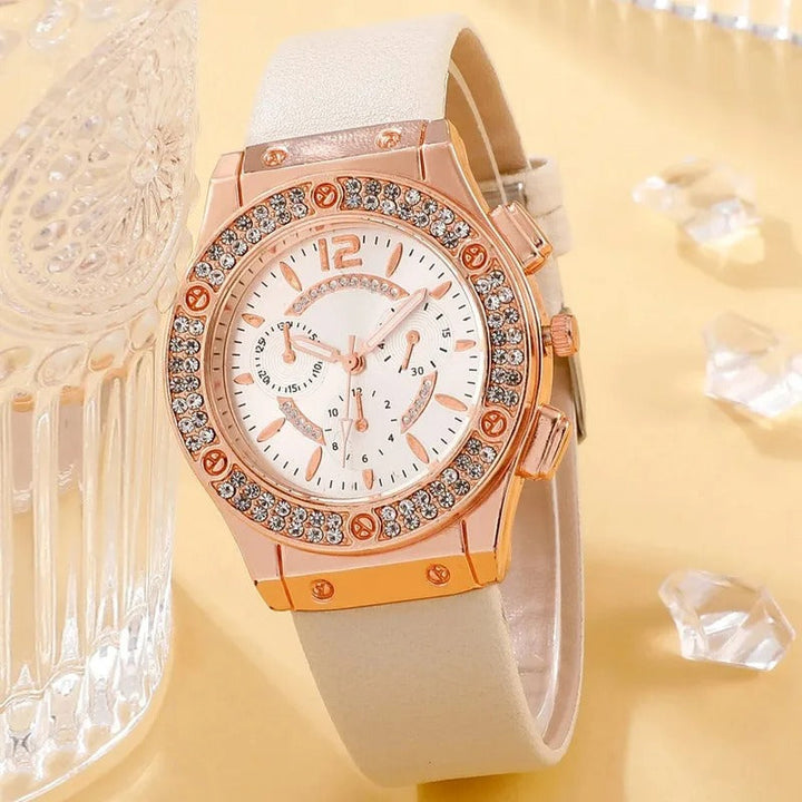 Silver- och guldfärgat damklockset med strass, två eleganta armbandsur som passar olika stilar.