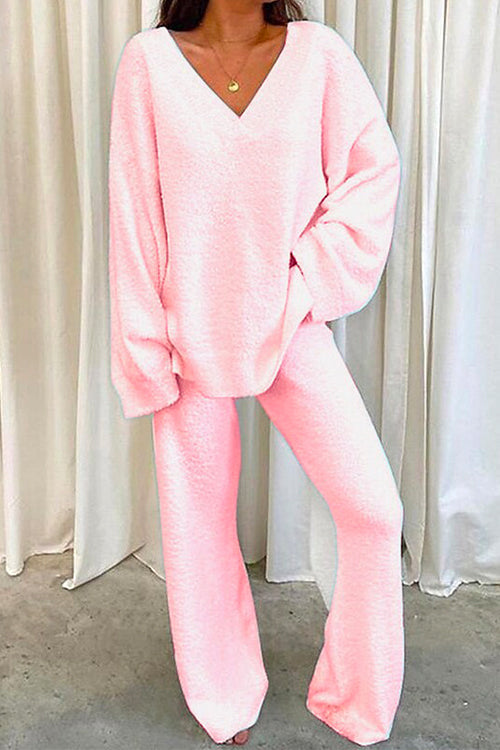 Stilrent kvinnors loungewear set med batwing ärmar och v-hals. Idealiskt för hemma eller casual mode.