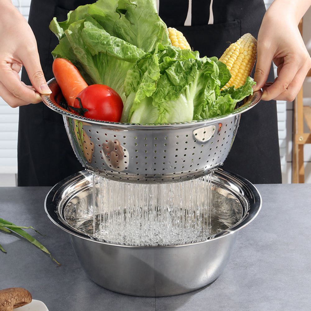 Grönsakshackare i rostfritt stål, komplett med utbytbara blad och inbyggt rivjärn.