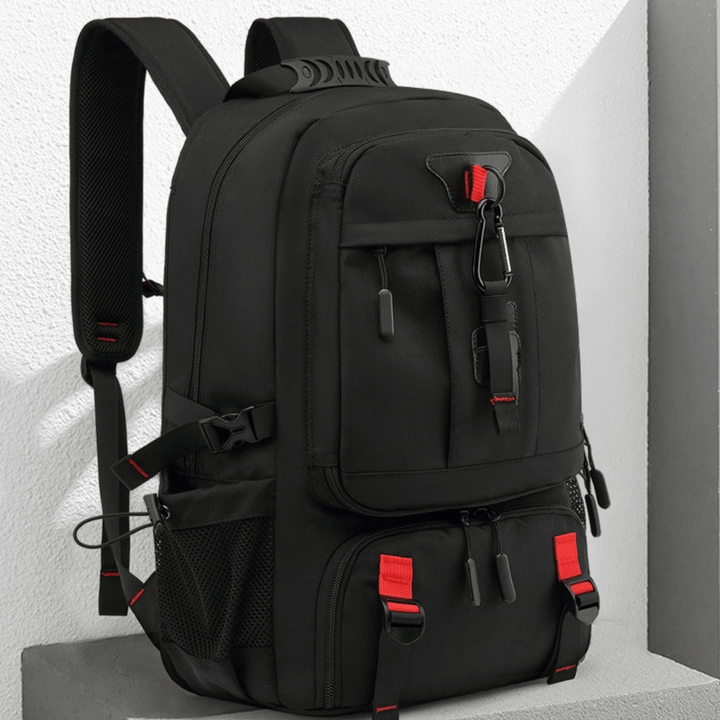 Unisex 50L ryggsäck med laptopfack & USB-laddning. Perfekt som resväska eller sportväska.