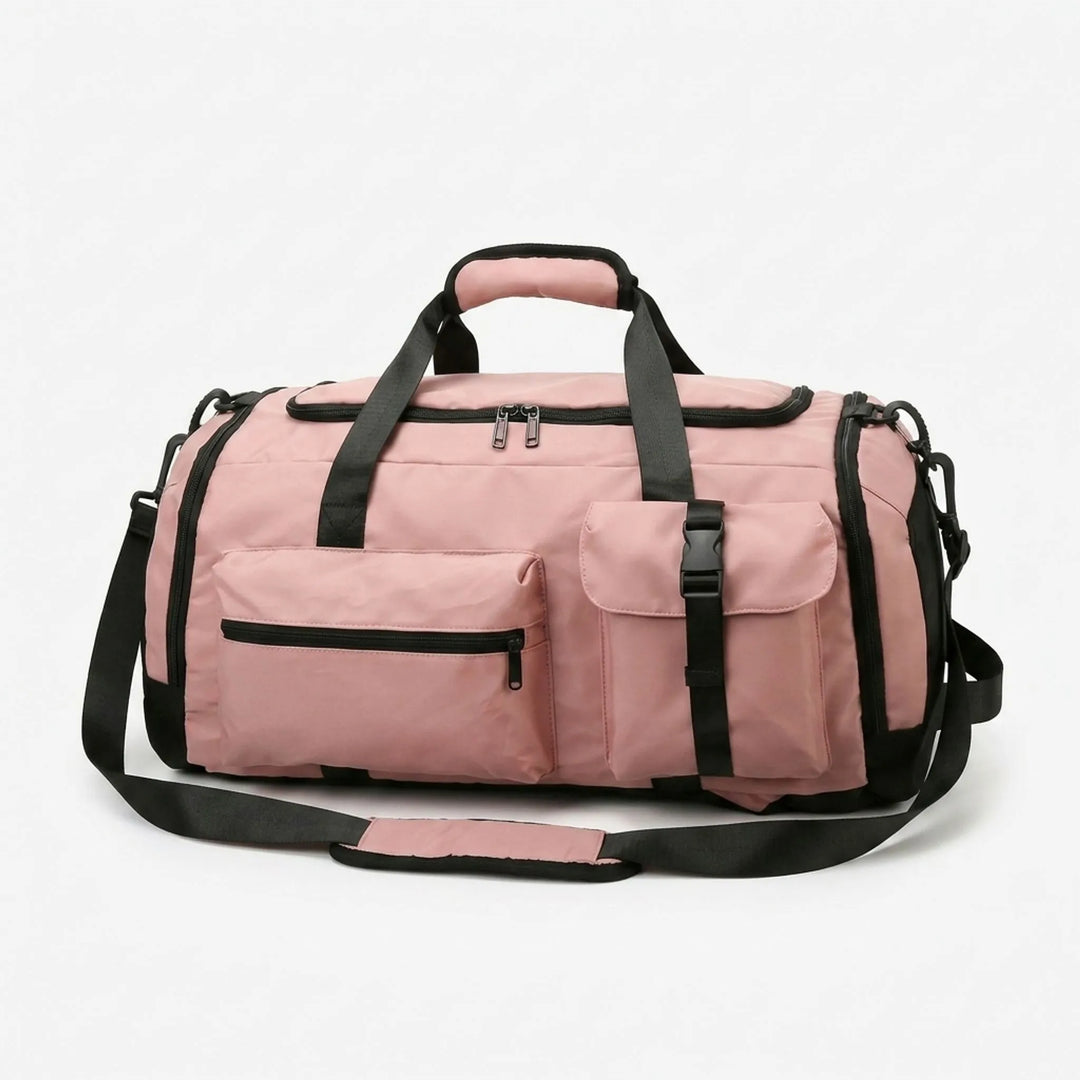 Orange unisex sportduffel/ryggsäck i oxfordtyg, idealisk för gymmet, träning och korta resor. Robust design.