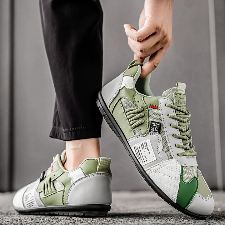 Mångfärgade färgblock sneakers, herrskor. Trendiga casualskor med modern design för en unik vardagsstil.