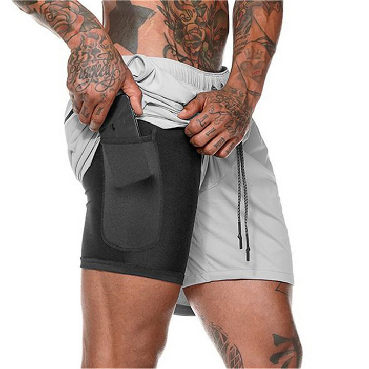 Herr dubbellager sportshorts med säker passform och fickor, idealiska för löpning, simning och andra sommaraktiviteter.
