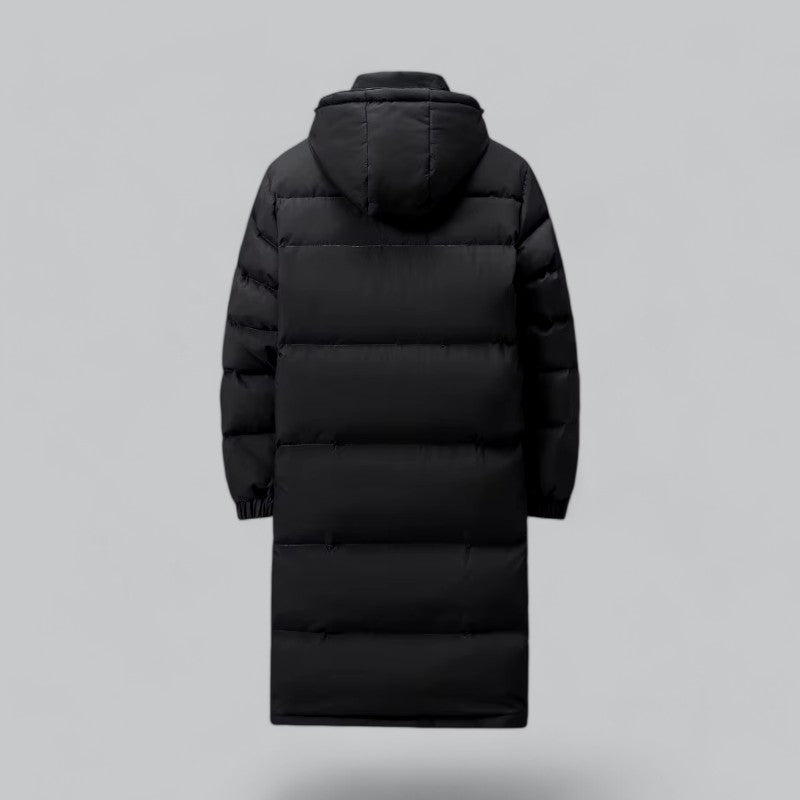 Herrjacka: Lång pufferparka i stilren design. Mörk vinterkappa som kombinerar värme med mode. Maskintvättbar och bekväm.
