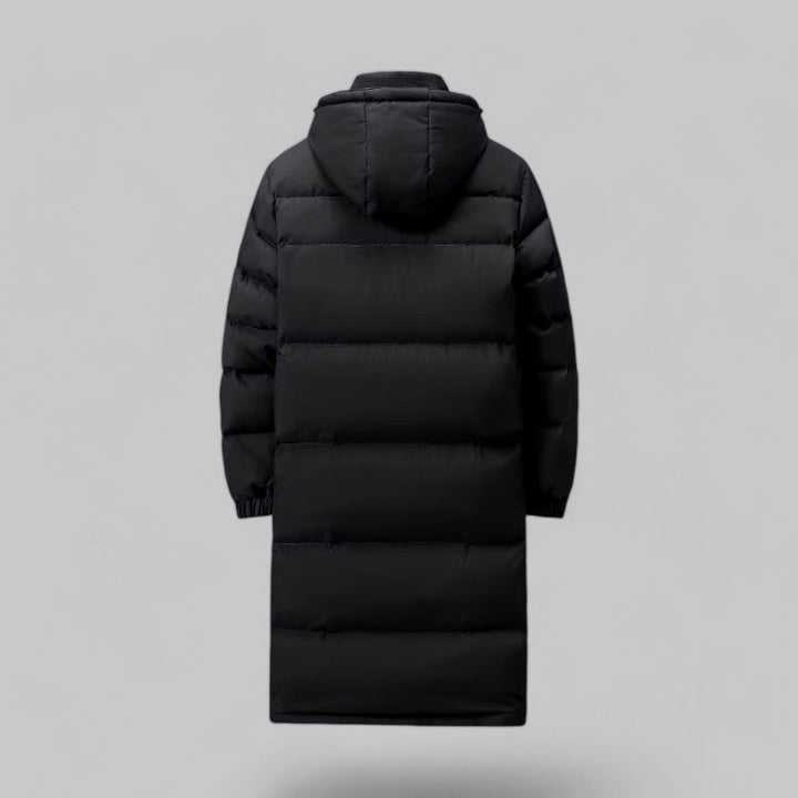 Herrjacka: Lång pufferparka i stilren design. Mörk vinterkappa som kombinerar värme med mode. Maskintvättbar och bekväm.