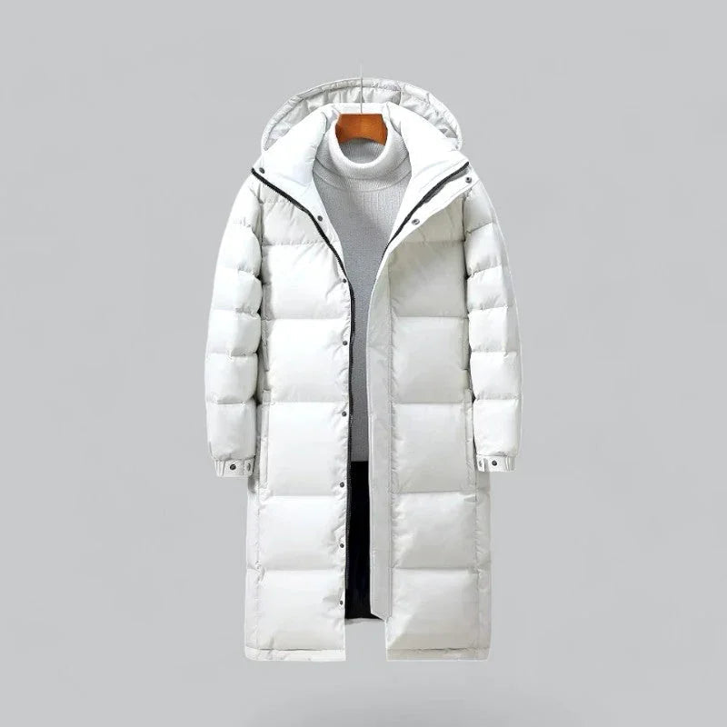 Lång herrparka i pufferdesign, idealisk vinterjacka för herrar. Håll dig varm i kallt väder.