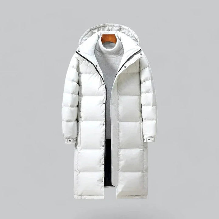 Lång herrparka i pufferdesign, idealisk vinterjacka för herrar. Håll dig varm i kallt väder.