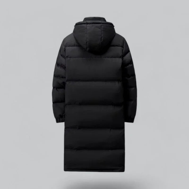 Stilfull herrparka i lång modell, perfekt som ytterkläder under vintern. Varm pufferjacka för stad och natur.
