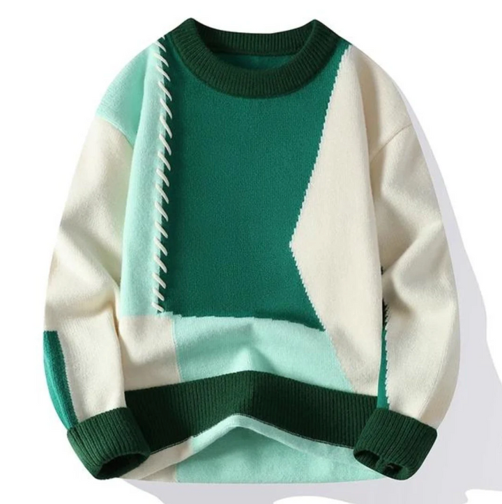 Kabelstickad herrtröja med unikt patchwork-mönster, perfekt för casual och varm höstmode.