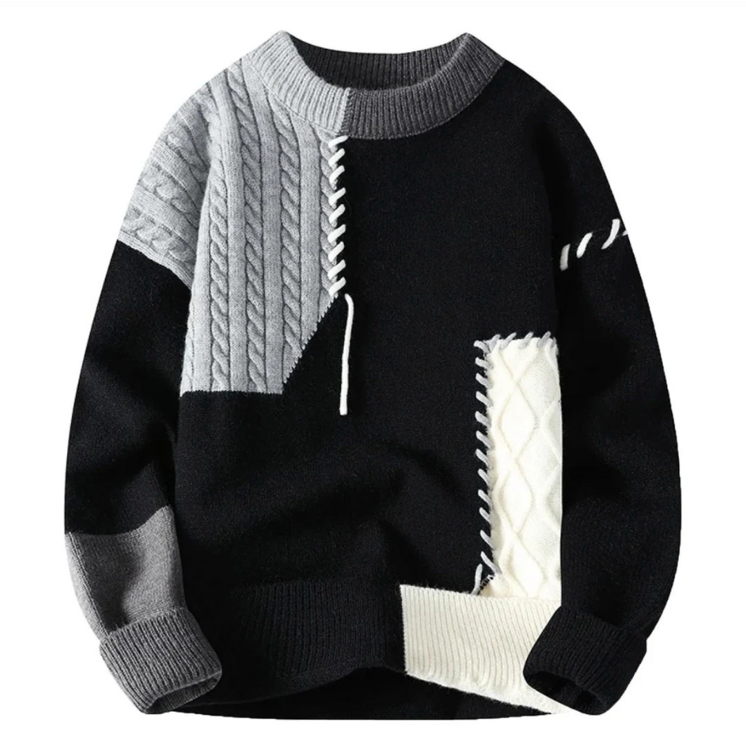 Modern stickad herrtröja med iögonfallande patchwork och färgblock, bekväm för höst/vinter.