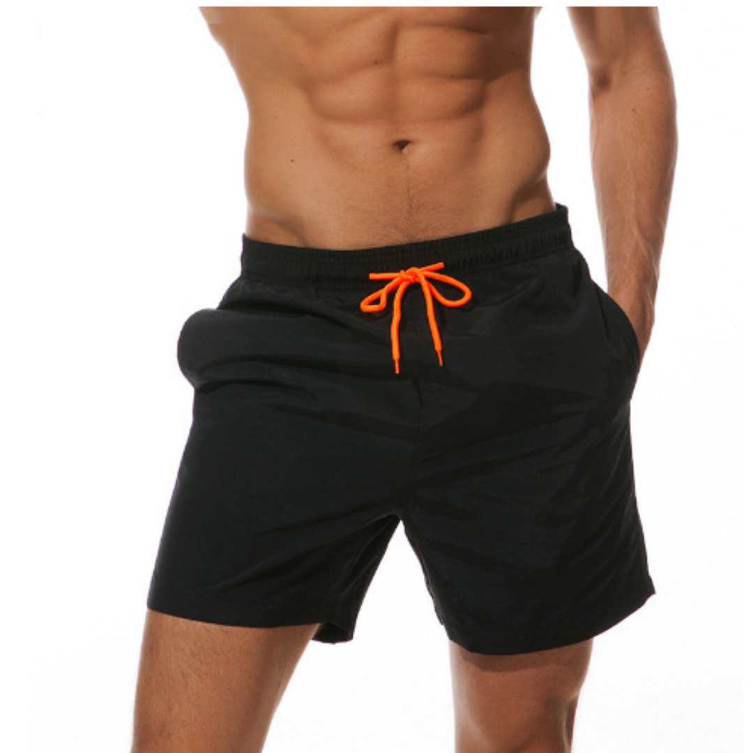 Mäns snabbtorkande badshorts för strand. Idealiska herrshorts för simning och sommarmode.
