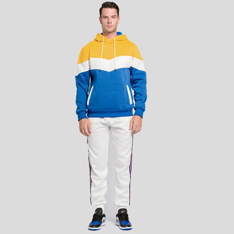 Framsida: modern herr patchwork hoodie. Varm och trendig streetwear för avslappnad stil.