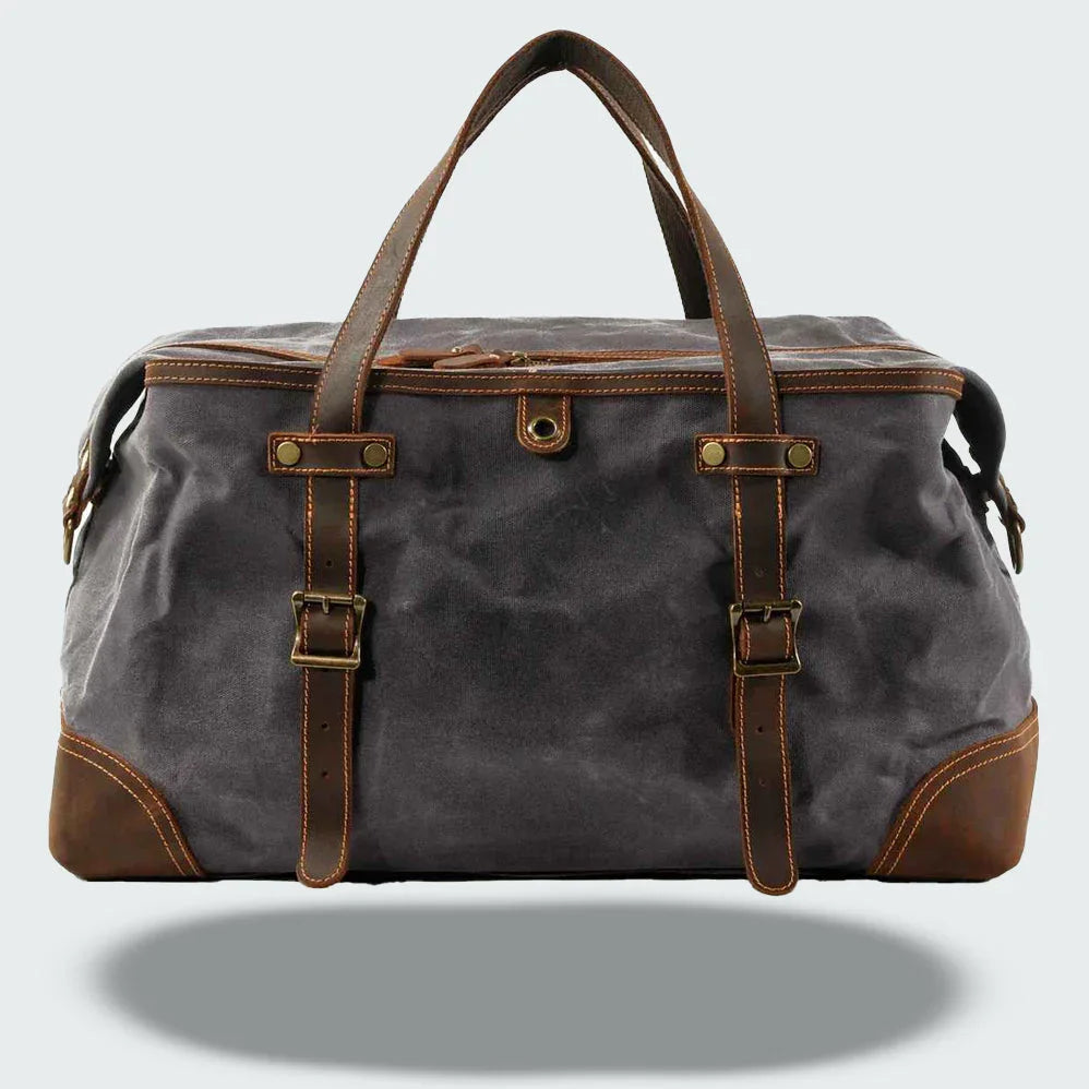 Robust carry-on resväska för herr, vintage canvas med läderdetaljer.