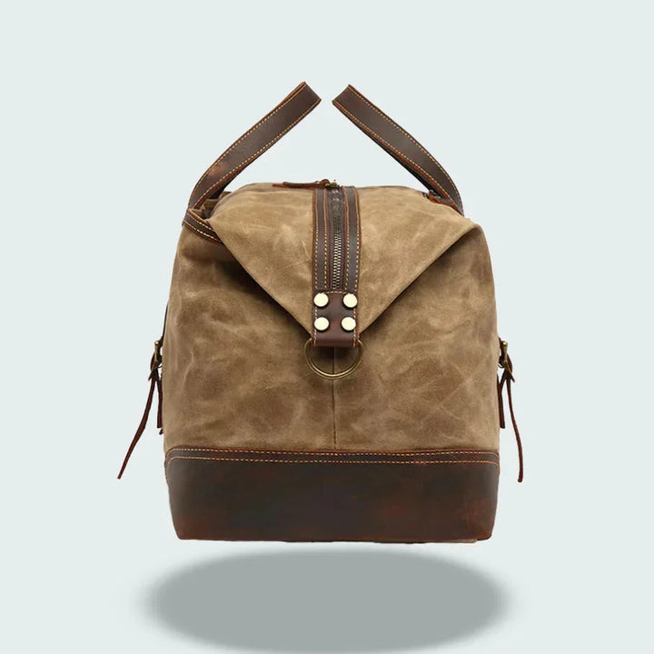 Snygg herrresväska för resan, vintage canvas med läderdetaljer, passar som carry-on.