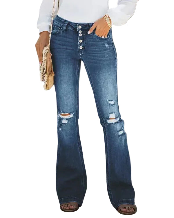 Mörkblå lågmidjade damjeans med rippade detaljer & knappstängning framtill, perfekt för vardagsbruk. Tillverkad av bomullsblandning.