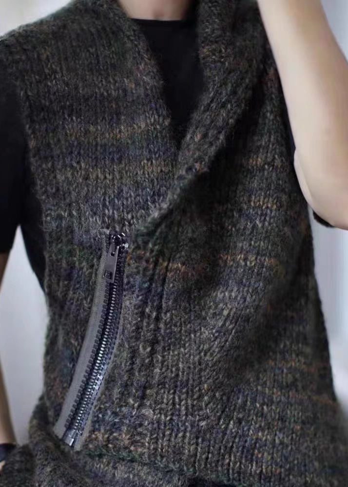 Casual asymmetrisk damväst i mörkgrått med snygg dragkedja. Mångsidig ärmlös väst för vardag och höstmode.