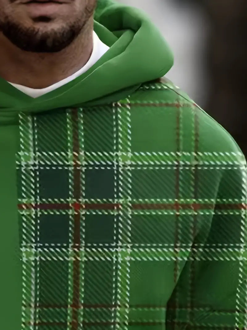 Herrhoodie med unikt mörkgrönt rutigt mönster. Trendig och bekväm för moderna vardagsoutfits.