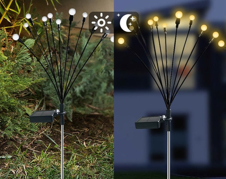 Väderbeständig solcellsbelysning med varmvita LED-ljus, imiterar eldflugor. Perfekt för energisnål utomhusbelysning.